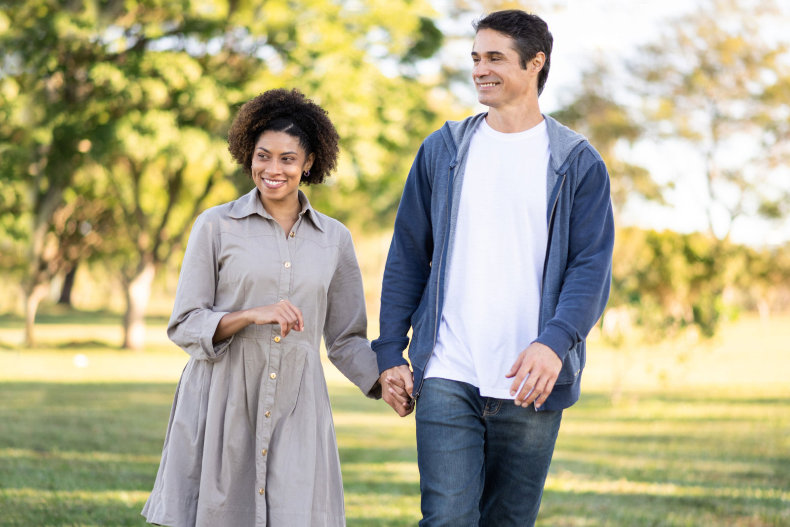 Walking through a park beside Parkside Living in Kemptville