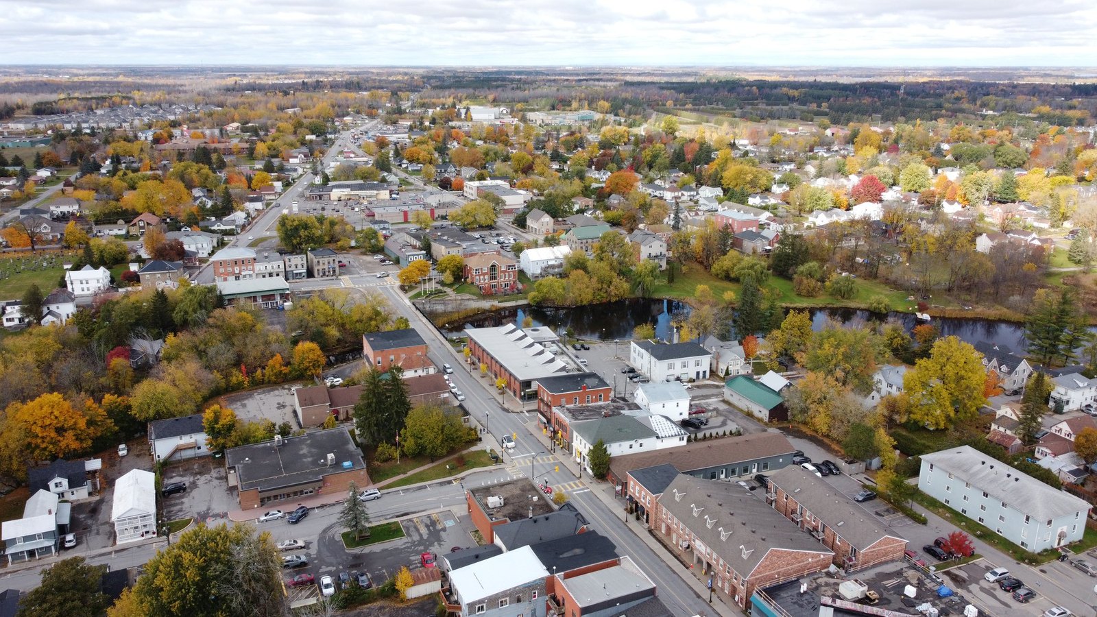 Aerial view of downtown Kemptville, Ontario along the Rideau River in autumn
