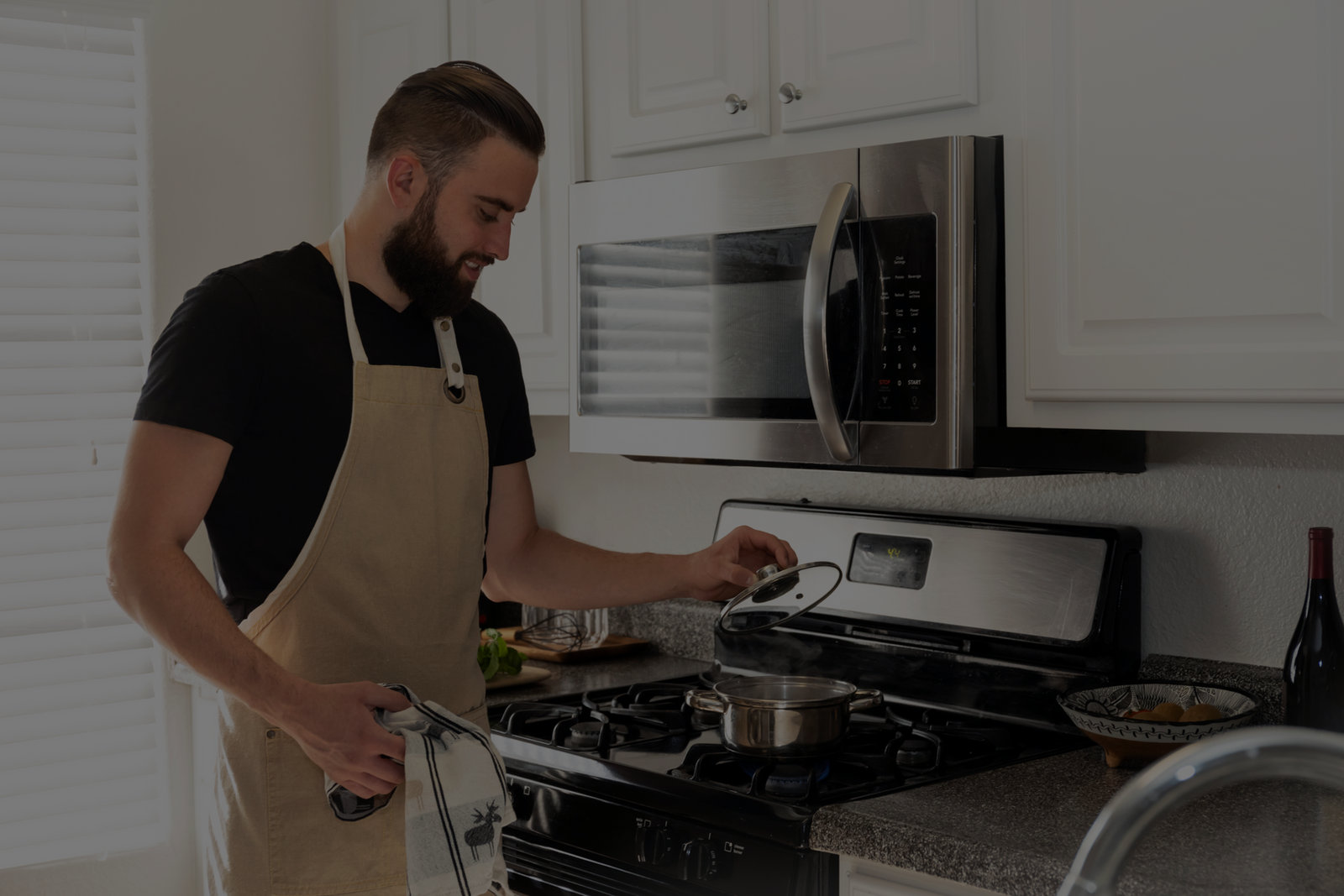 Resident cooking in a Parkside Living kitchen